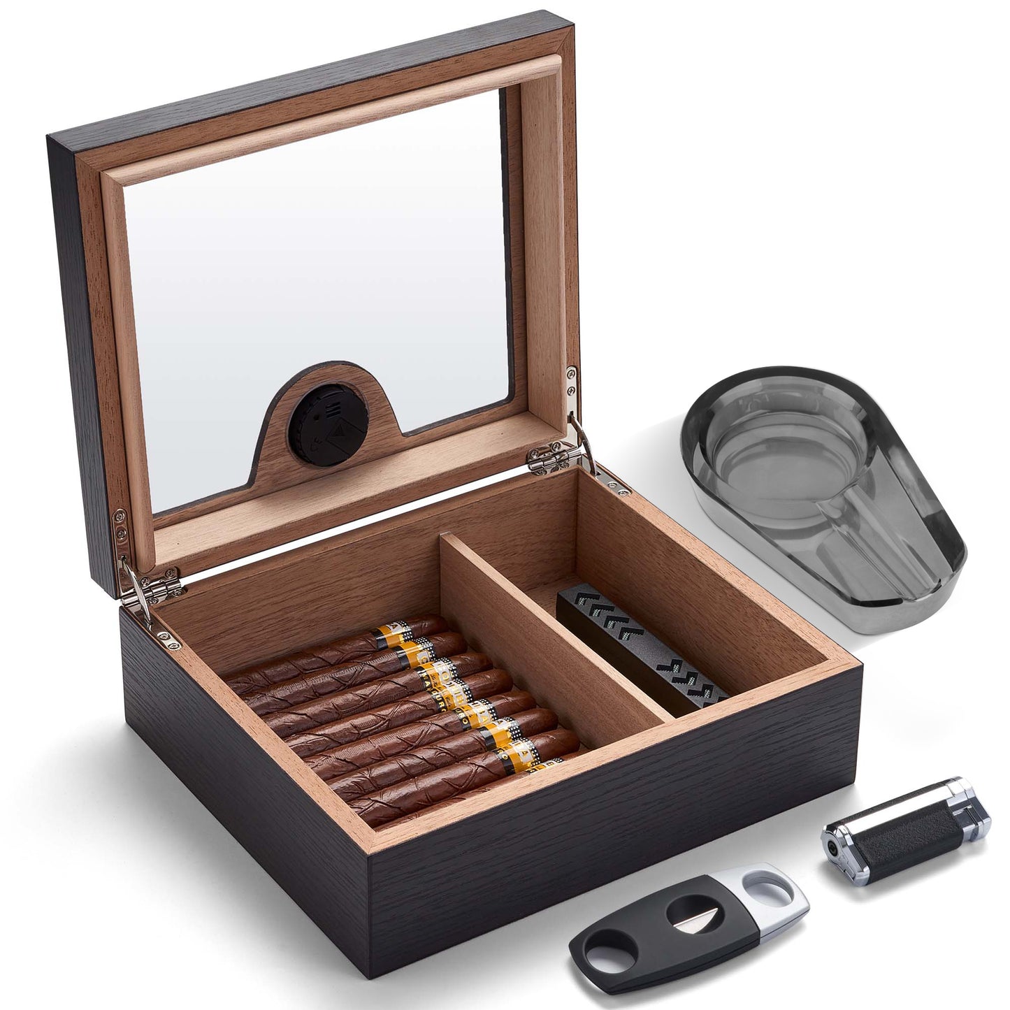 Open humidor with Spanish cedar interior, removable divider, and organized cigar storage, paired with included accessories.