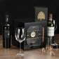 Glossy black cigar humidor displayed with wine and cigar accessories, perfect for luxury home bar decor and gifting to cigar lovers.