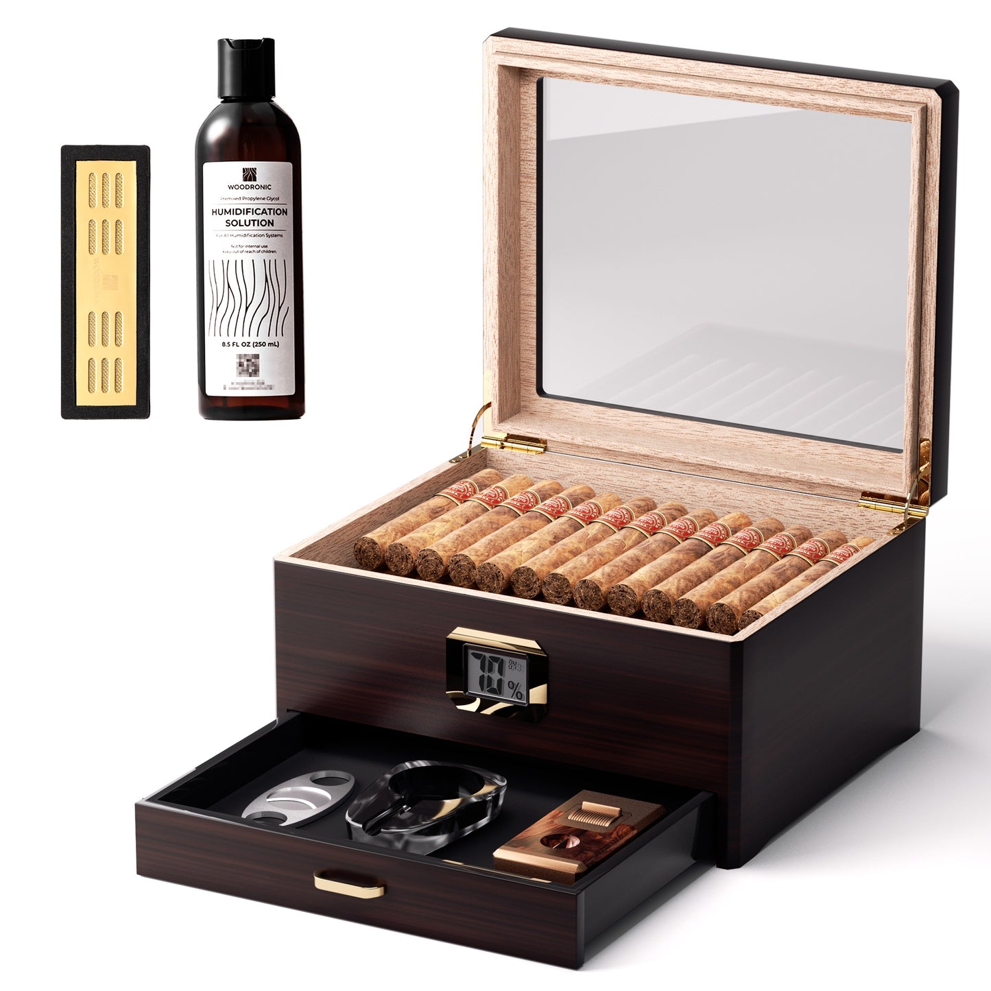 An open humidor revealing its full capacity of cigars inside, paired with humidification solution, crystal gel humidifier, and the pull-out drawer holding an ashtray, cutter, and lighter, set against a white background.