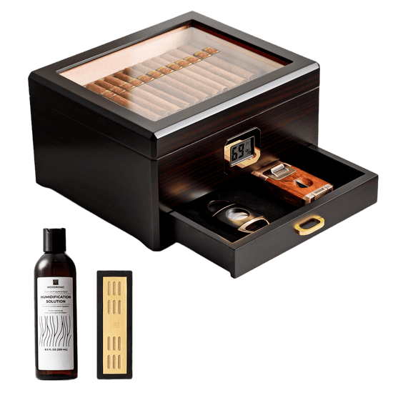 A dark wooden cigar humidor with a glass top, digital hygrometer, and pull-out accessory drawer, displayed with its full set: humidification solution, crystal gel humidifier, ashtray, cutter, and lighter, against a white background.