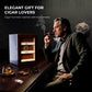 Sophisticated man enjoying a cigar beside the humidor, positioning it as a premium gift for cigar enthusiasts.