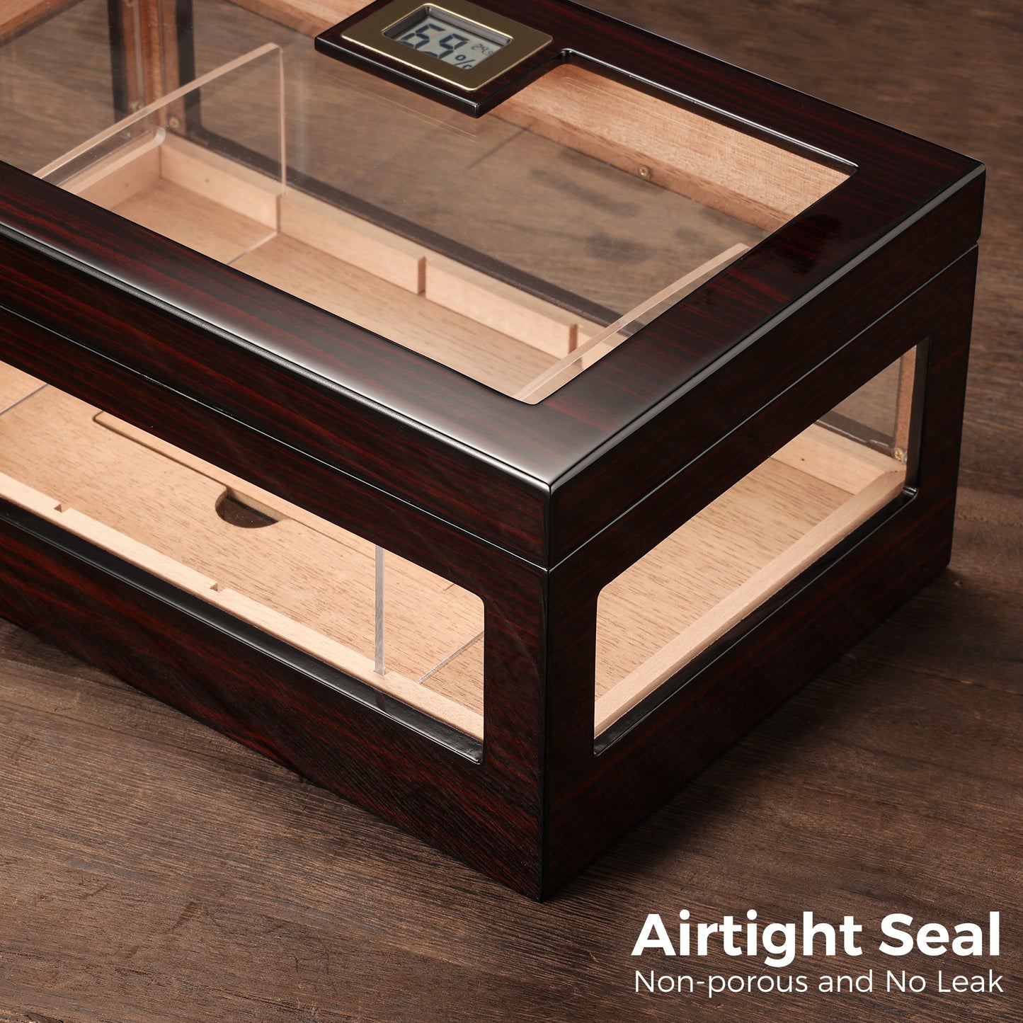Cigar humidor with airtight non-porous seal and digital hygrometer, ensuring stable humidity levels for optimal cigar preservation.