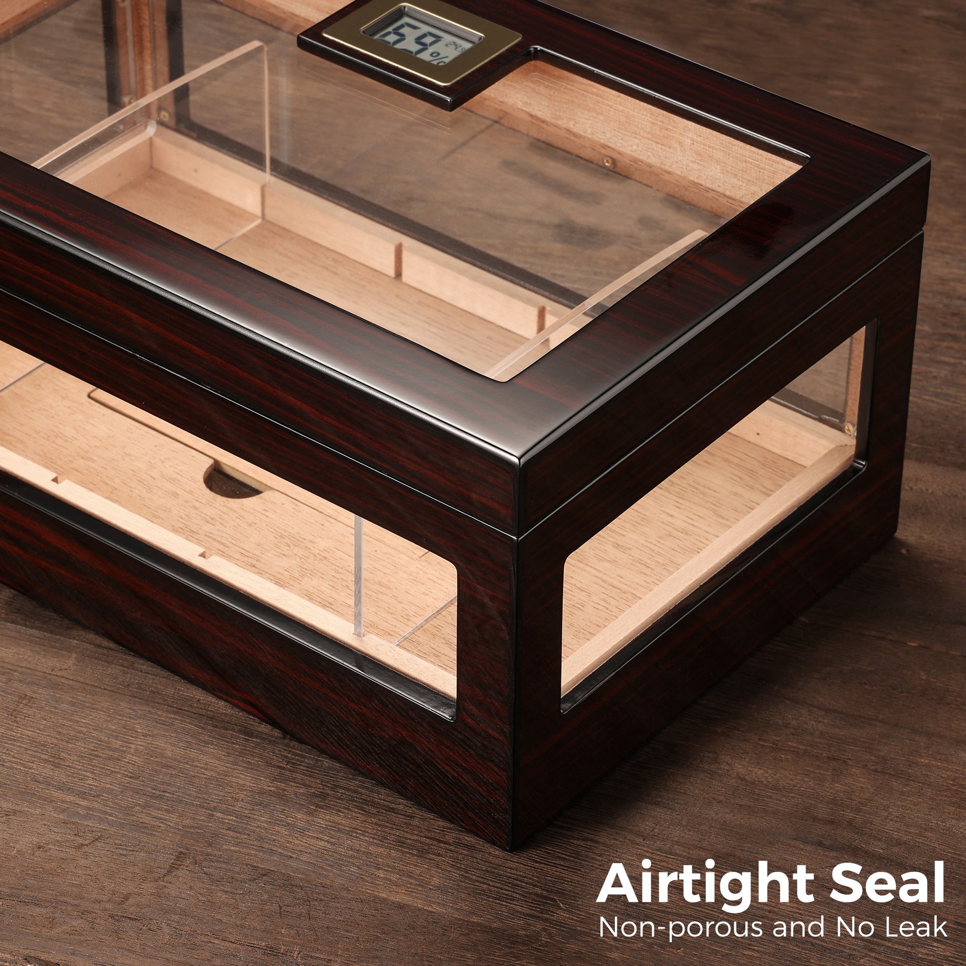Cigar humidor with airtight non-porous seal and digital hygrometer, ensuring stable humidity levels for optimal cigar preservation.