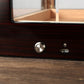 Close-up of cigar humidor LED control button and USB charging port, showing easy operation and rechargeable lighting system.