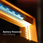 Close-up of battery-powered LED strip inside cigar humidor, showing easy installation and warm glow for display.