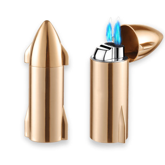 Gold rocket lighter shown in closed and open states, highlighting double torch flame and compact form.