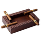 Rectangular solid walnut cigar ashtray with 4 cigar slots and hand-carved texture, holding premium cigars.