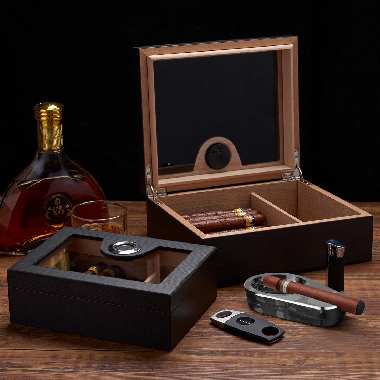 Open humidor displayed with premium cigars and whiskey, ideal for elegant home bar decor and gifting to cigar enthusiasts.