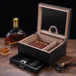 Open humidor displayed with premium cigars and whiskey, perfect for elegant home bar decor and gifting.
