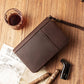 Closed cigar case styled with a crystal whiskey glass, cigar cutter, ashtray, and two premium cigars on a wooden table, creating a sophisticated gentleman’s lounge aesthetic.